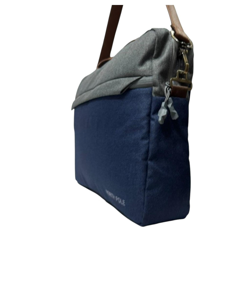 North Pole laptop messenger bag in a two-tone blue and grey canvas material with brown faux leather handles.