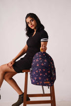 North Pole backpack in navy blue with a leaf pattern,Travel backpack, Casual backpack, Laptop backpack, Durable backpack, Lightweight backpack, Multi-compartment backpack, Unisex backpack, Teen backpack, Kids backpack,