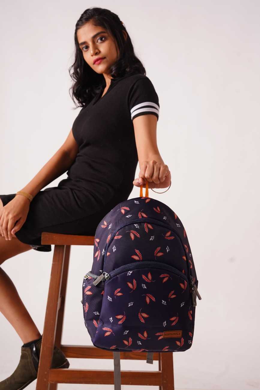 North Pole backpack in navy blue with a leaf pattern,Travel backpack, Casual backpack, Laptop backpack, Durable backpack, Lightweight backpack, Multi-compartment backpack, Unisex backpack, Teen backpack, Kids backpack,