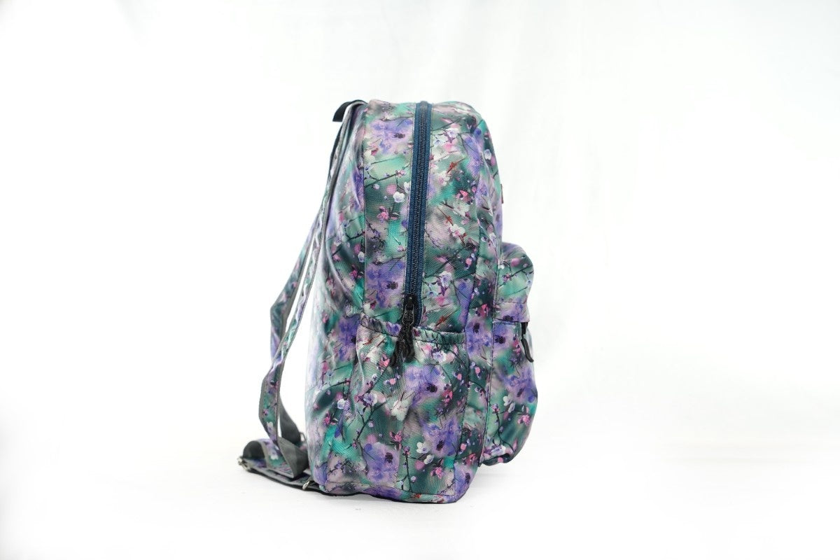 North Pole| Backpack with a purple and green floral print.Casual backpack, School backpack, College backpack, Travel backpack, Laptop backpack, Colorful backpack