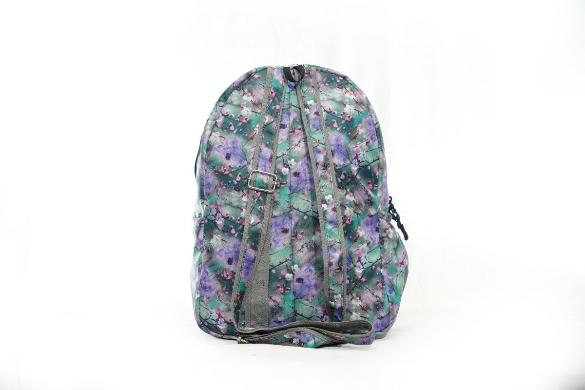 North Pole| Backpack with a purple and green floral print.Casual backpack, School backpack, College backpack, Travel backpack, Laptop backpack, Colorful backpack