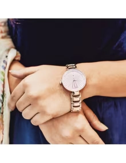 Fastrack Ruffles Quartz Analog with Date Pink Dial Stainless Steel Strap Watch for Girls.