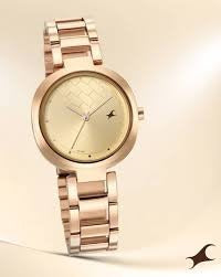 Fastrack Stunners Quartz Analog Golden Dial Stainless Steel Strap Watch for Girls.