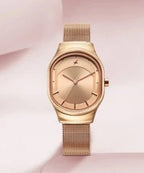 Fastrack Snob X Rose Gold Dial Stainless Steel Strap Watch for Girls.