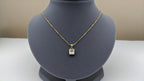 yellow gold geometric glistening lab-grown diamond pendant necklace.